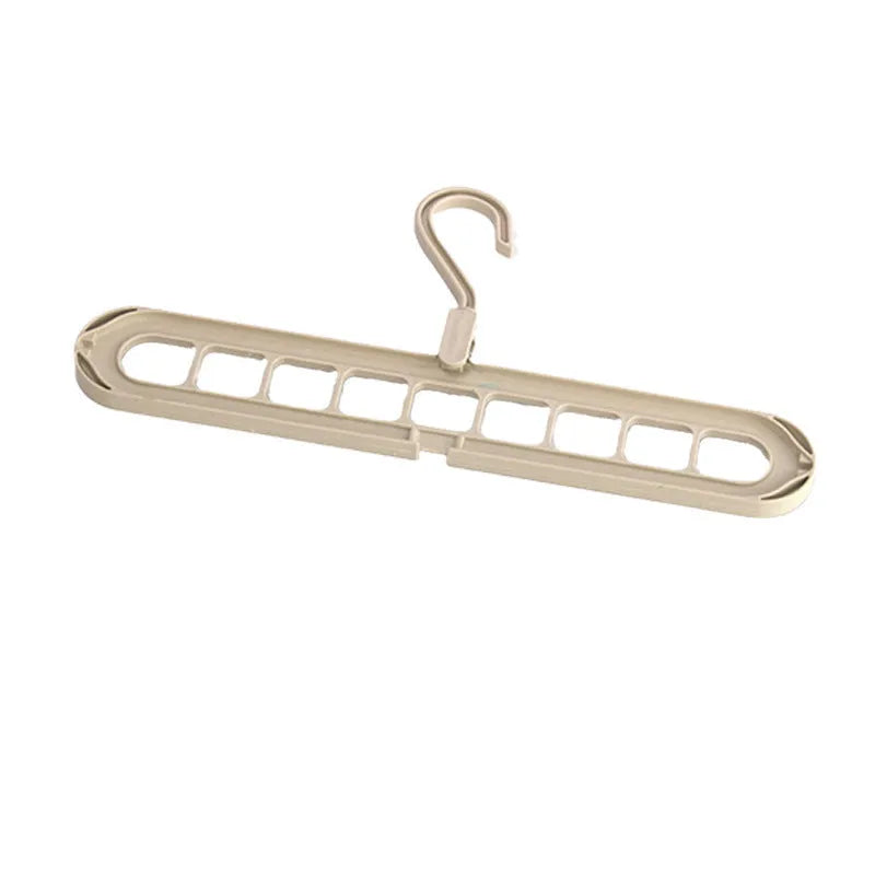 Nine-hole plastic folding pant hanger shown in beige, blue, gray, green, and pink colour options