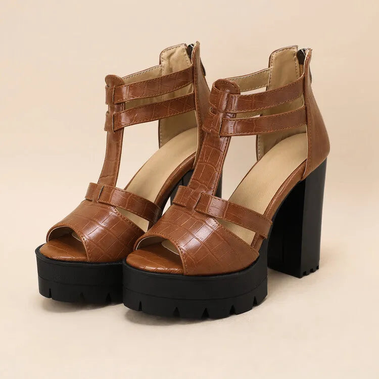Women's black platform high heel sandals with a back zip and round toe on a rubber sole.