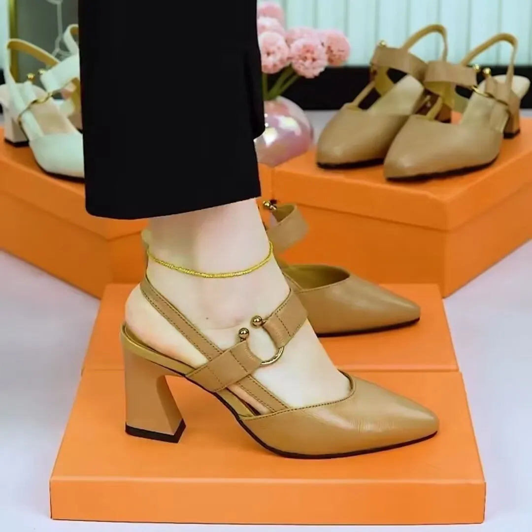 Women's black closed toe high heel sandals with a chunky rubber sole and pigskin leather upper.