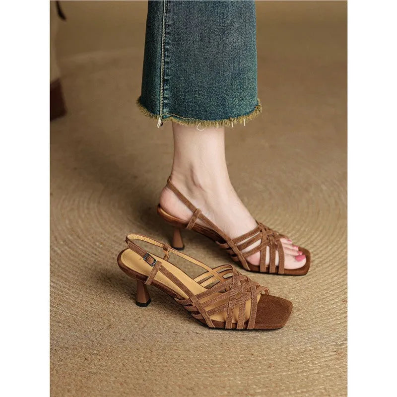 Retro soft leather-look women's sandals with thin cross straps, square toe, ankle buckle, and a mid-height heel