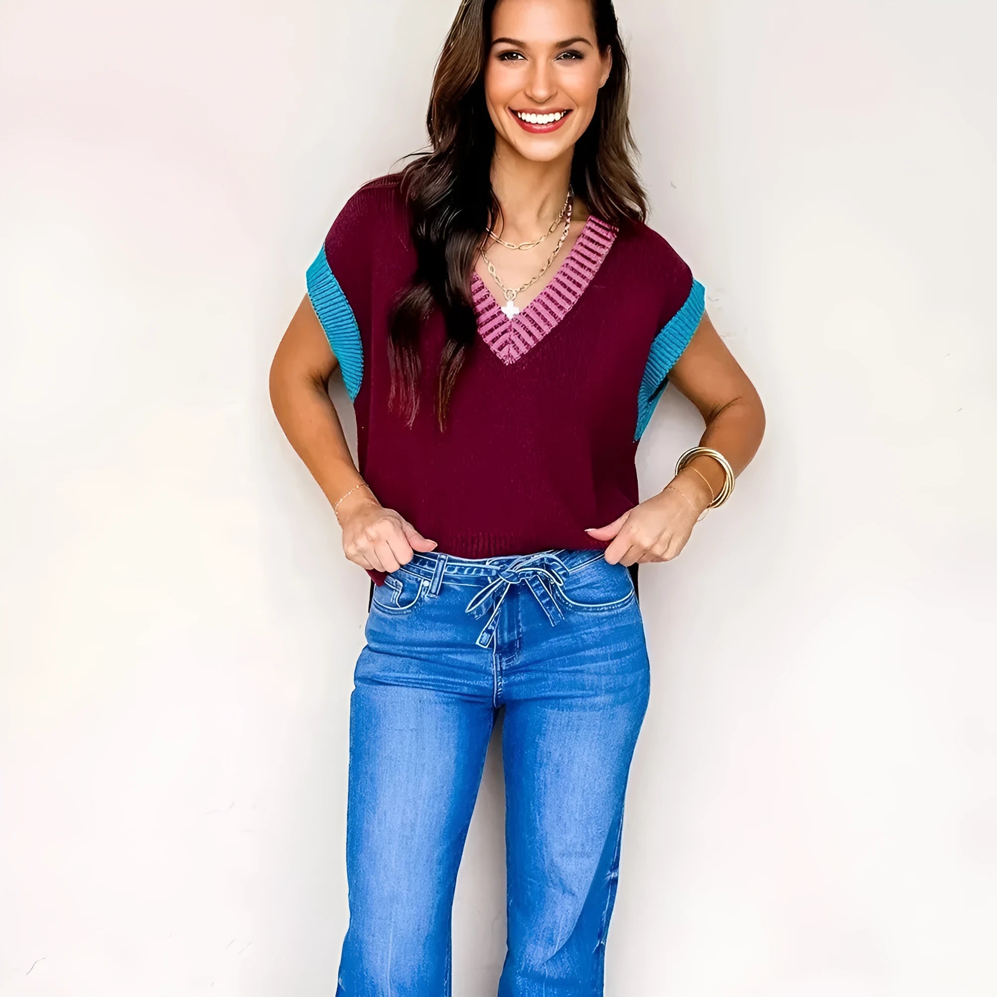 Burgundy V-neck loose sweater with contrast trim and cuffed short sleeves
