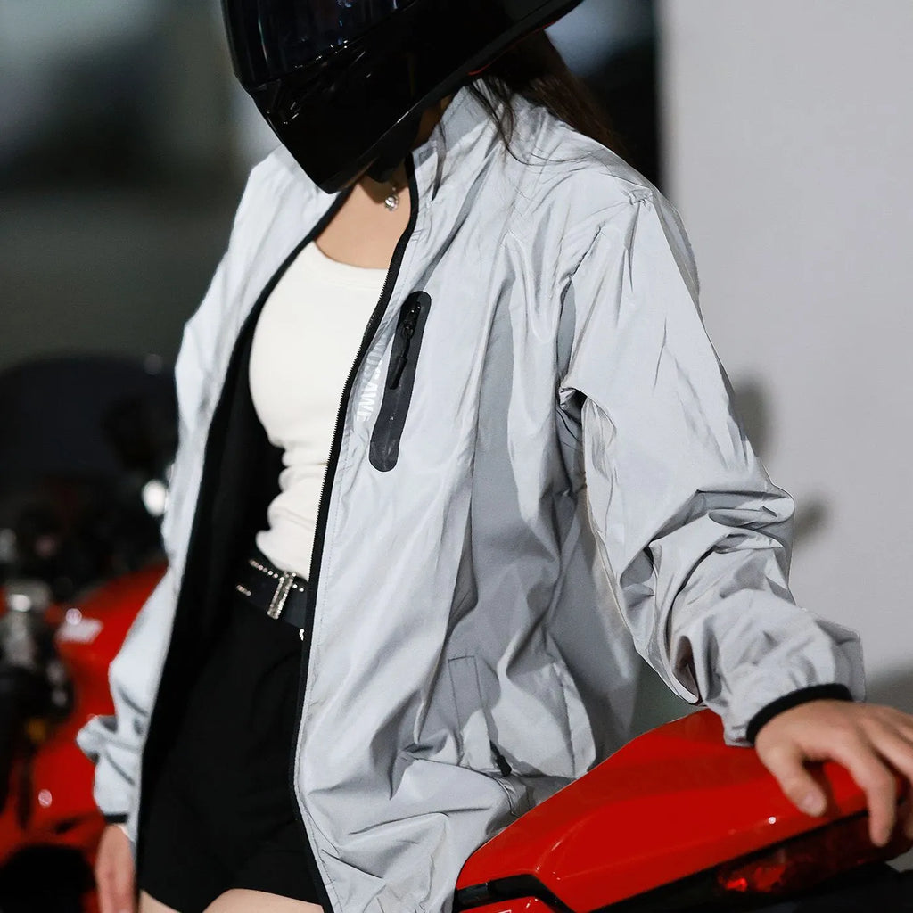 Silver long-sleeved waterproof polyester windproof jacket on a hanger.
