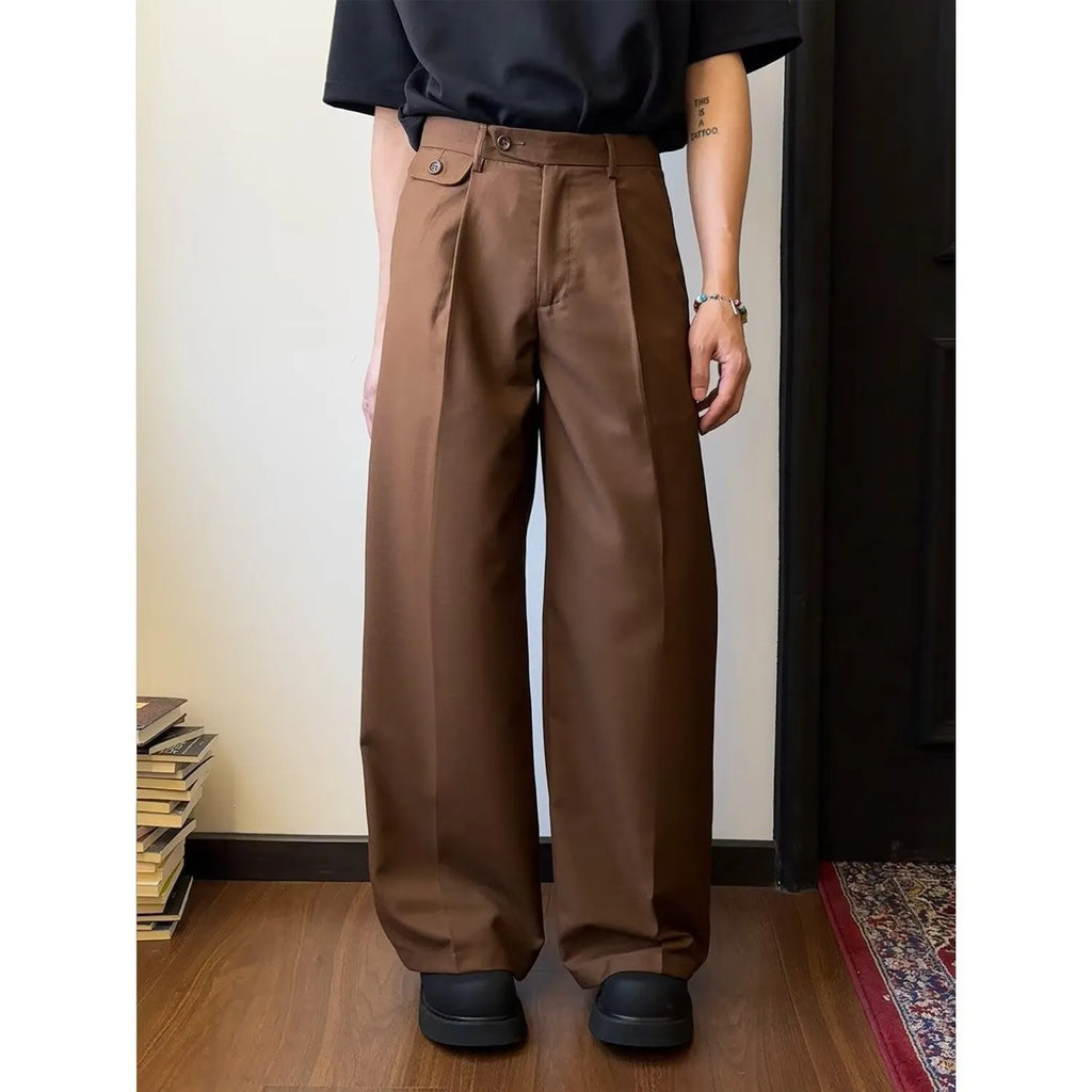 Men's brown straight-leg casual trousers with loose wide-leg design on hanger