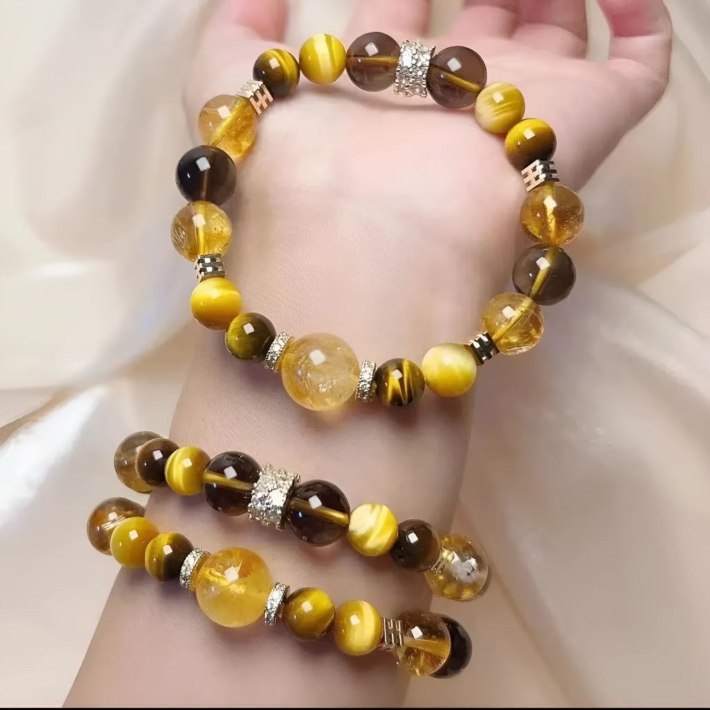 Close-up of a natural yellow artificial crystal string bead bracelet with 10mm tower-shaped beads.
