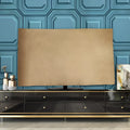 Soft pink velvet TV cover draped over a flat-screen television.