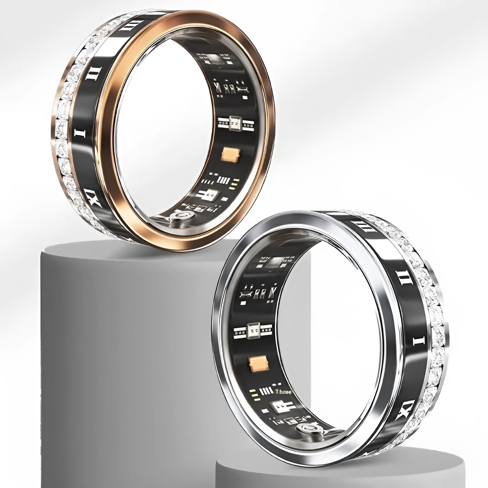 Gold and silver diamond inlaid smart ring for health tracking on a finger.
