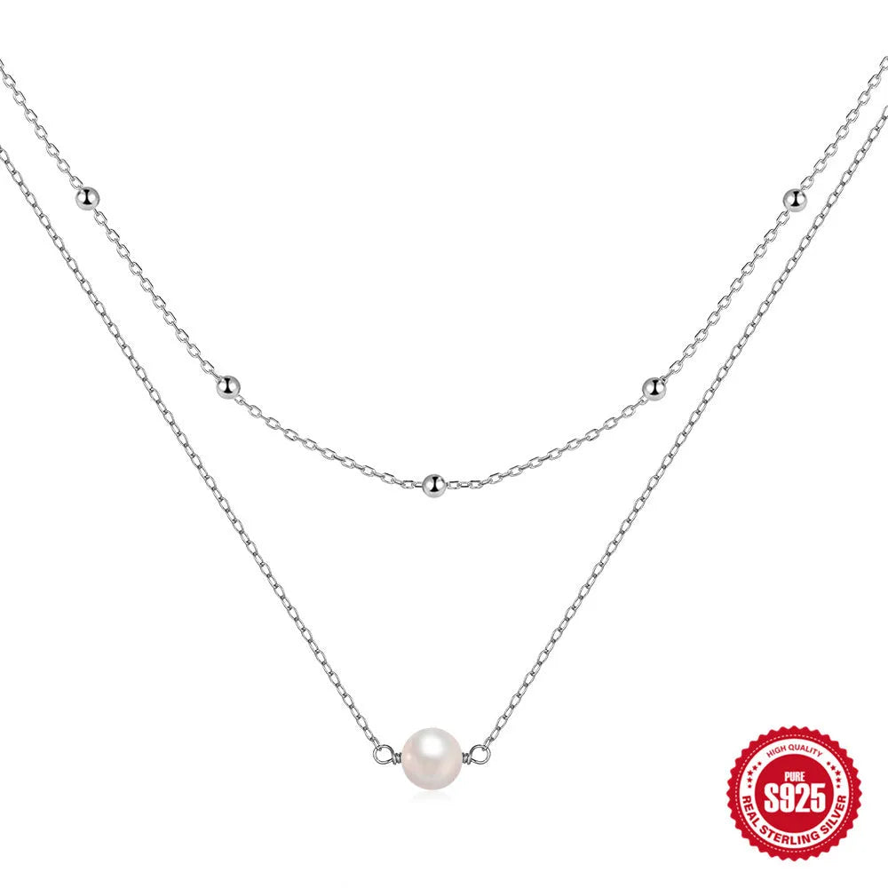 S925 sterling silver double layer necklace with geometric twin pearl pendant on a ball bead chain.