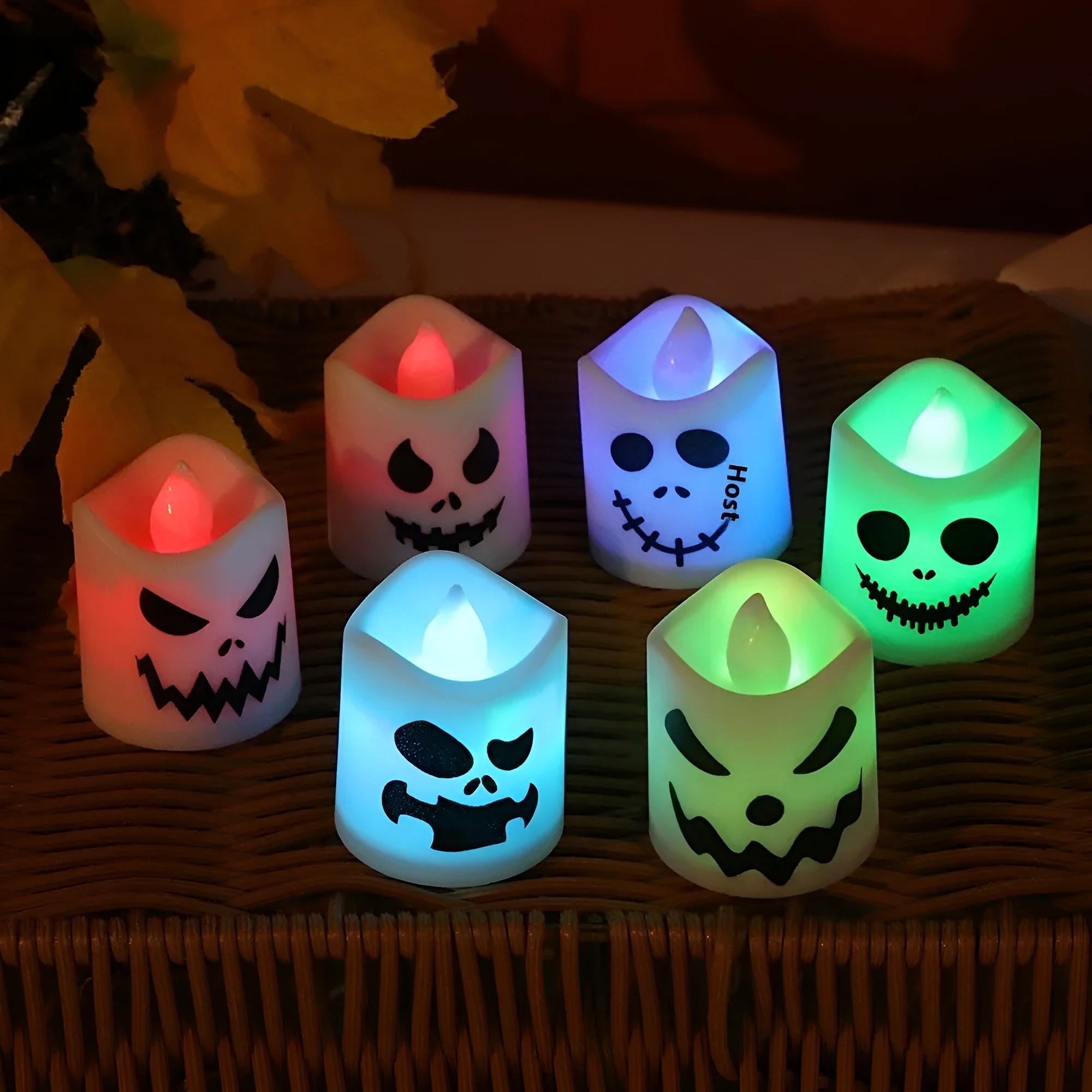 Multicolour LED electronic candles with ghost design in 24-pack for Halloween decoration