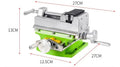 Bench-mounted drilling and milling machine with motor, chuck, and adjustable work table.