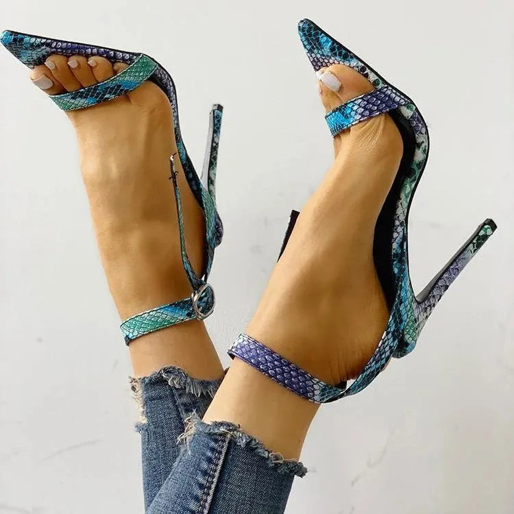Blue women's high heel shoes with hollow-out design and buckle fastening, shown in large sizes.