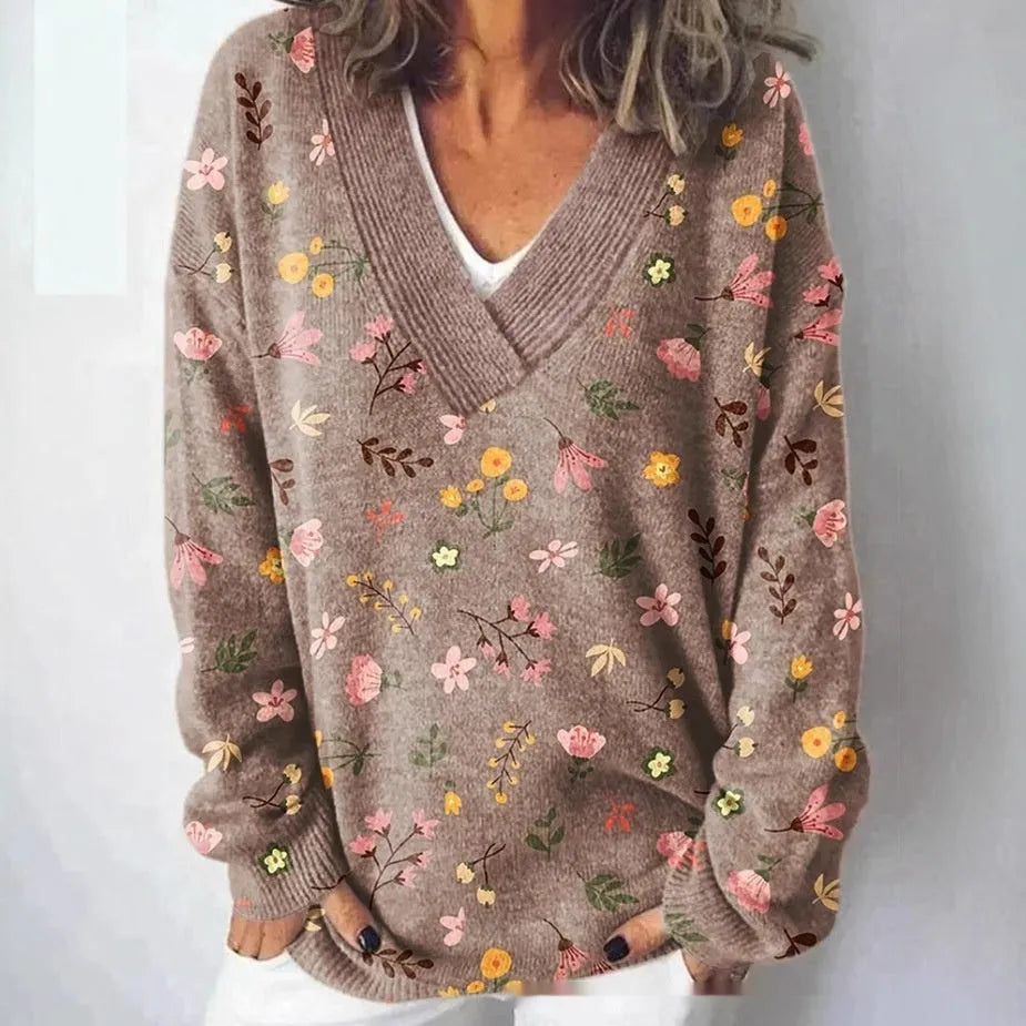 Women's V-neck long sleeve sweatshirt with a detailed 3D floral print pattern.