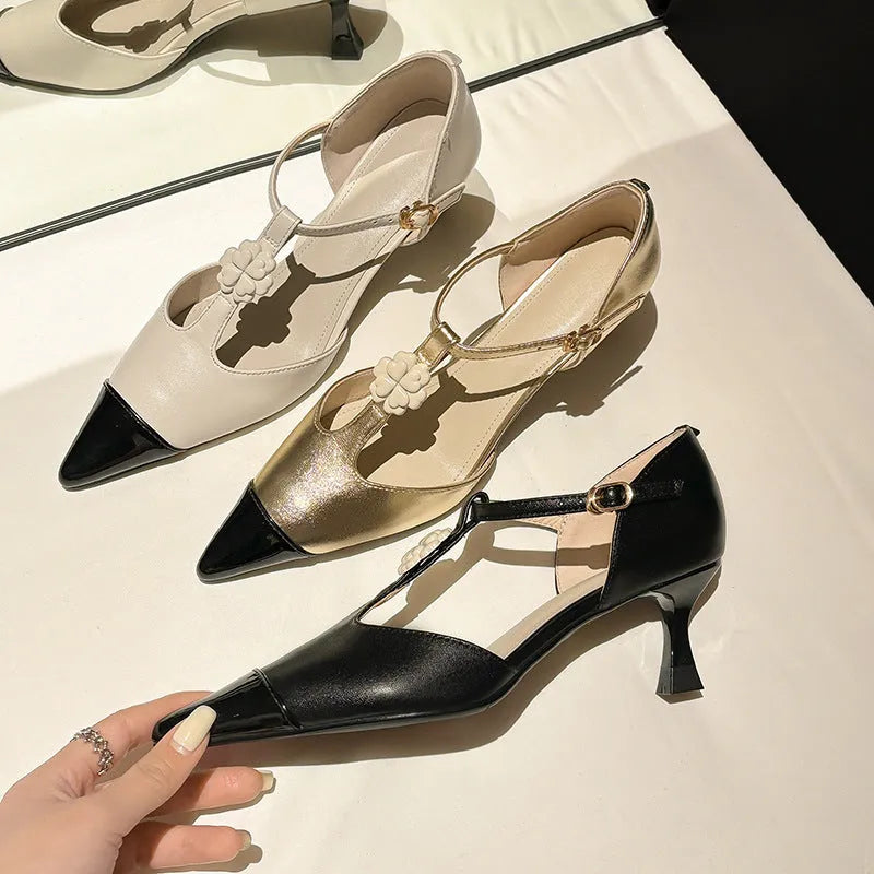 Women's gold stiletto heel shoes with flower decoration and pointed toe