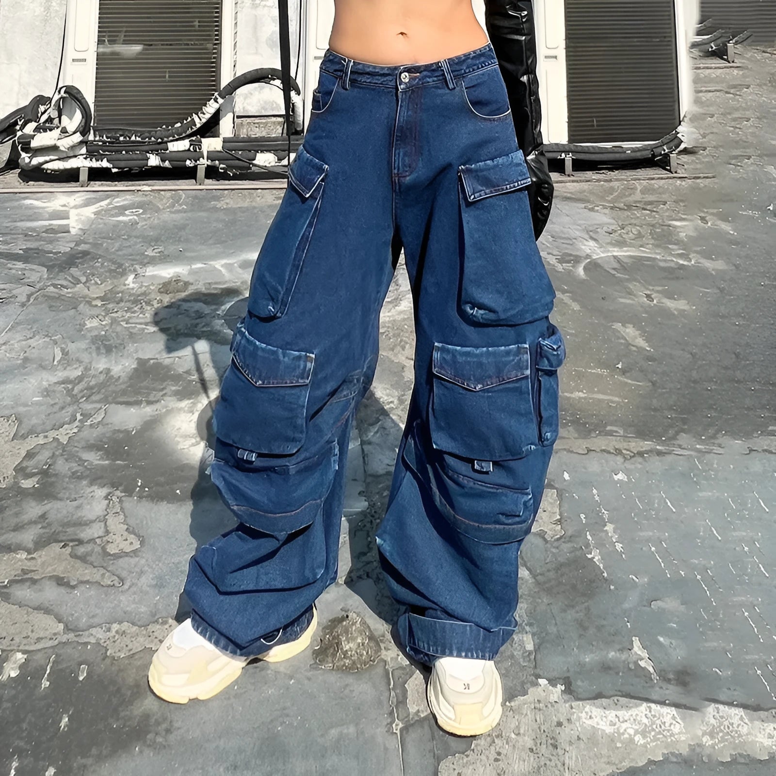 Dark blue distressed wide-leg women's jeans with high waist and multiple pockets.