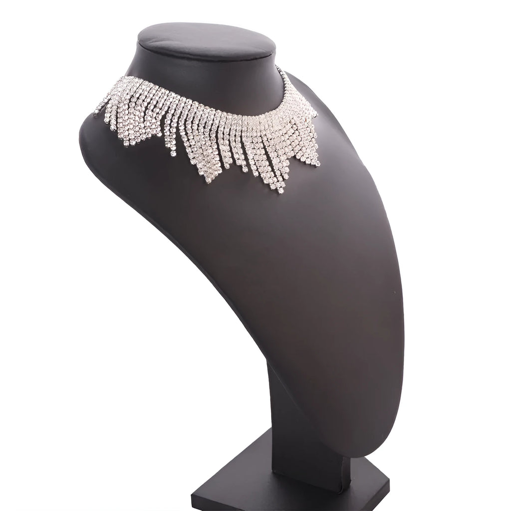 Alloy necklace with gold electroplated finish, geometric tassel pendant, diamond centre, box chain on white background