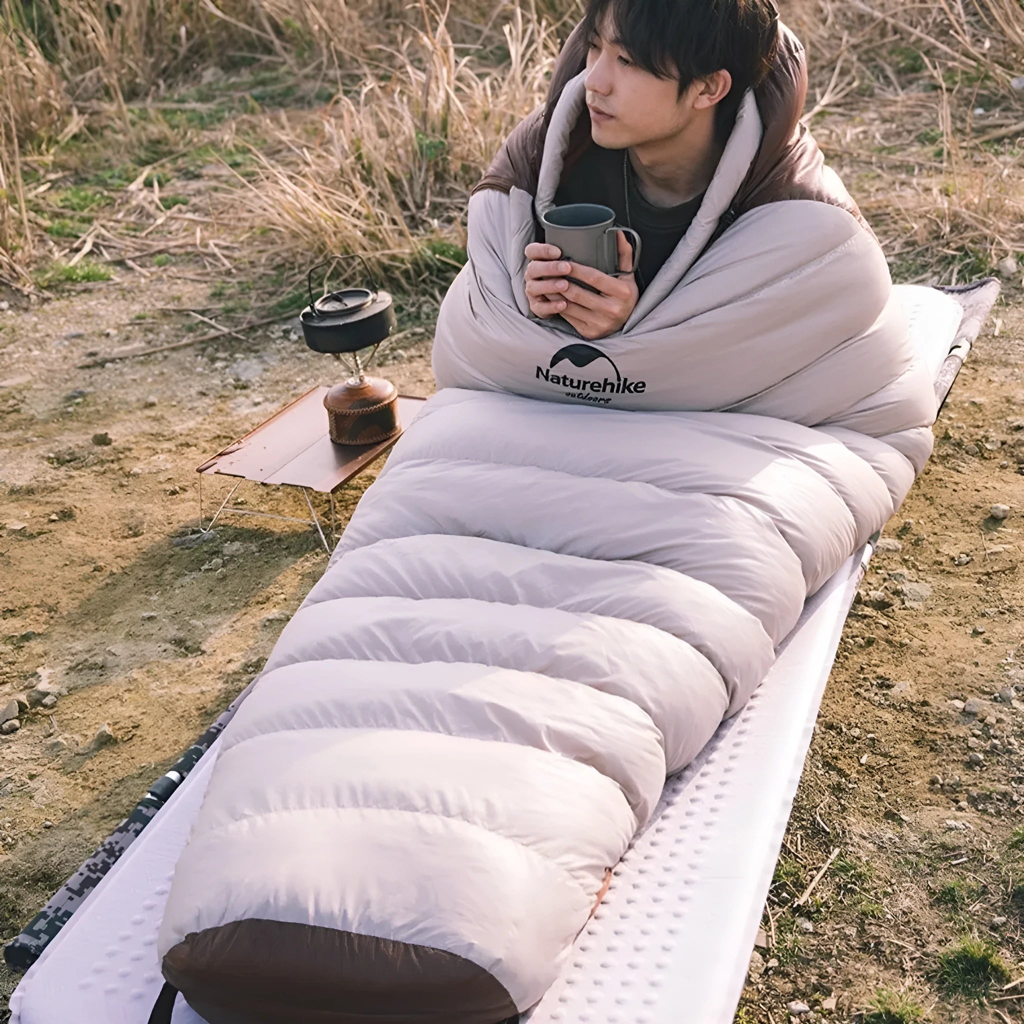 Snowbird goose down mummy sleeping bag in snowbird colour with storage bag.