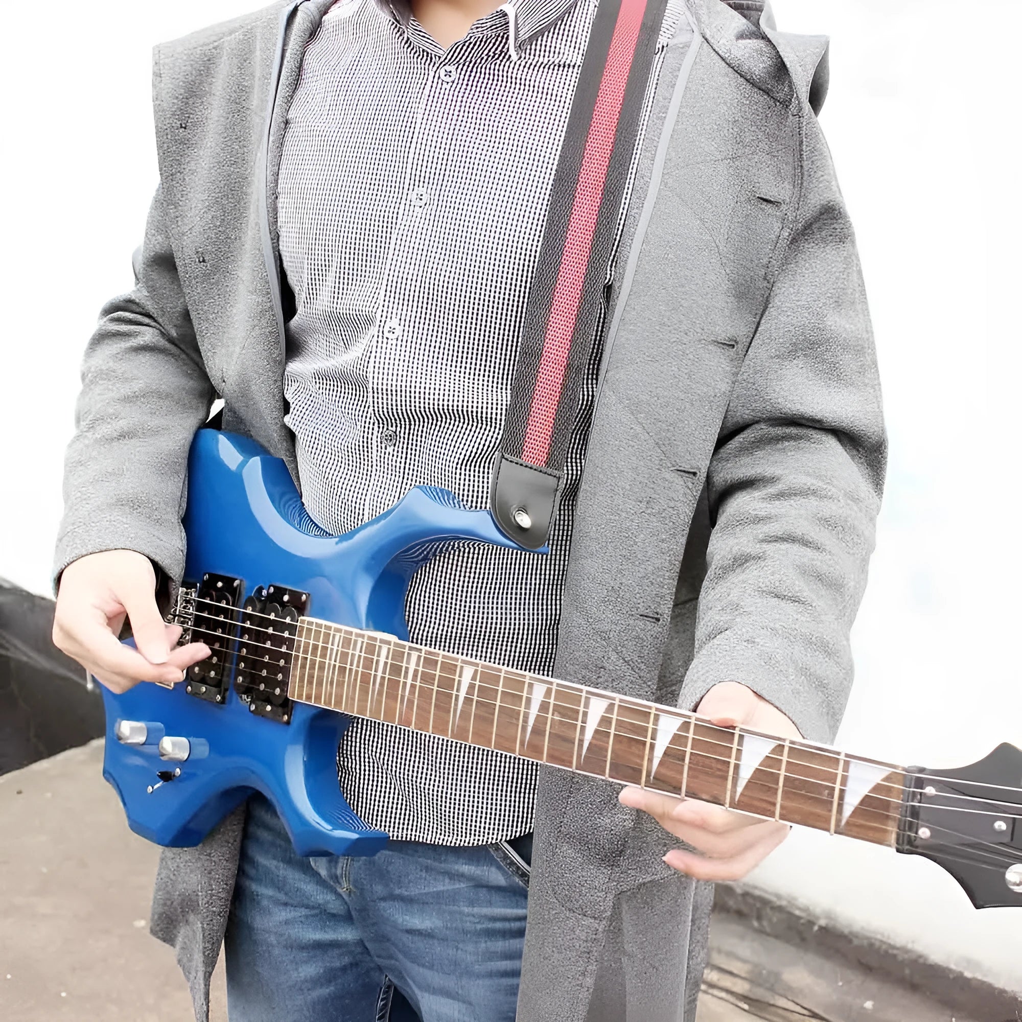 Woven crossbody instrument strap for guitars and ukuleles shown in multiple colour options.