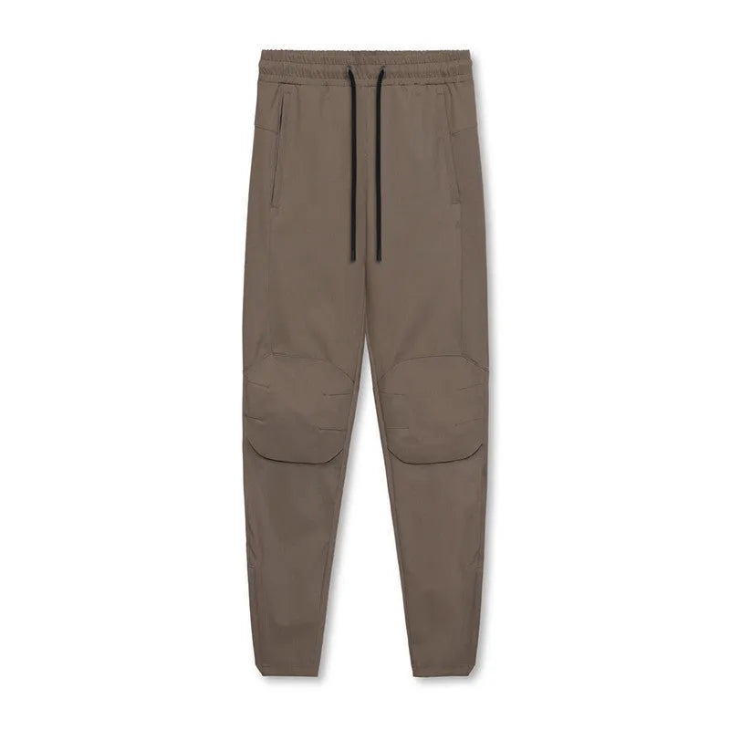 Men's grey quick-dry fitness pants with ankle ties in loose casual style