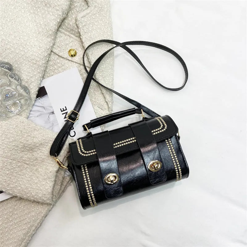 Versatile fashion portable messenger bag in black PU with three-dimensional pocket, square shape
