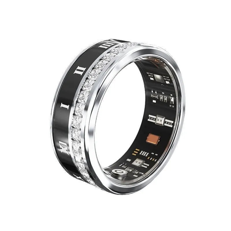 Gold and silver diamond inlaid smart ring for health tracking on a finger.