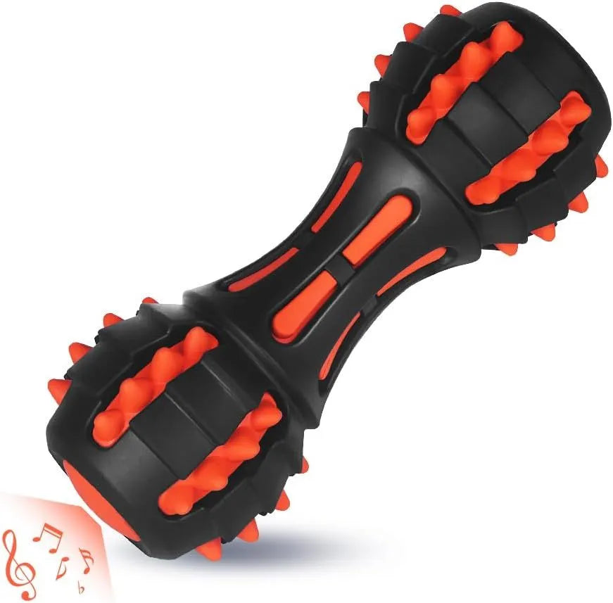 Red dumbbell-shaped dog chew toy with textured surface for medium to large breed aggressive chewers