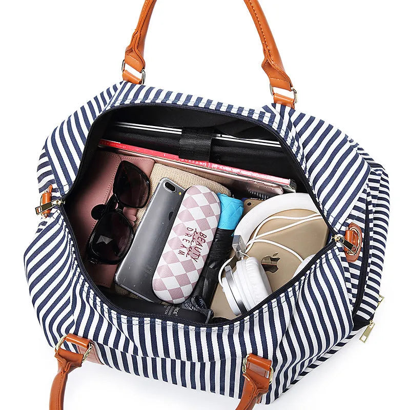Large canvas striped contrast colour travel duffel bag with zipper closure and polyester lining
