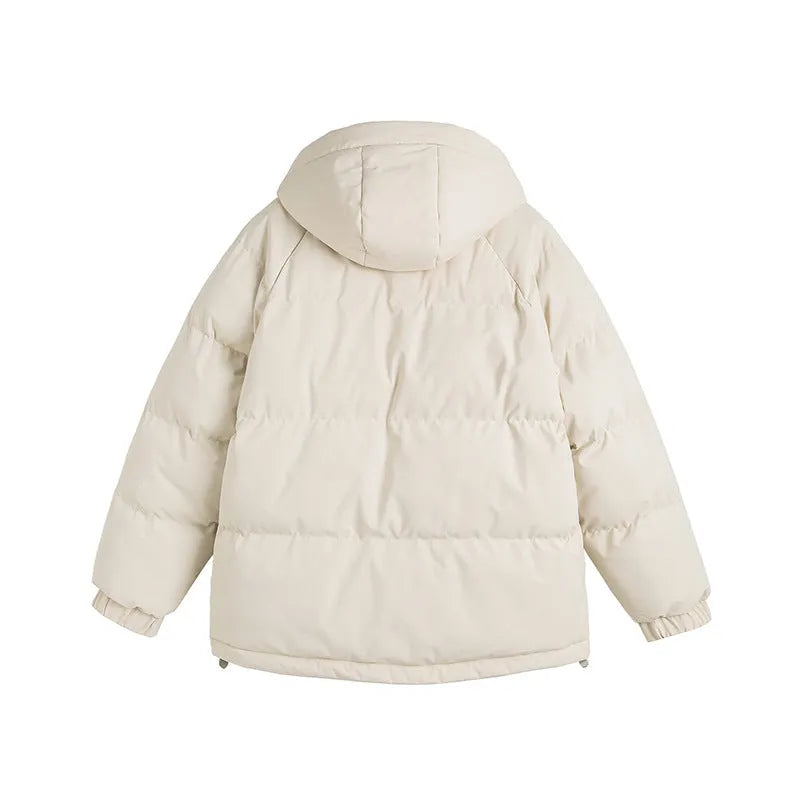 Loose fit winter coat in polyester with side seam pockets available in six solid colours