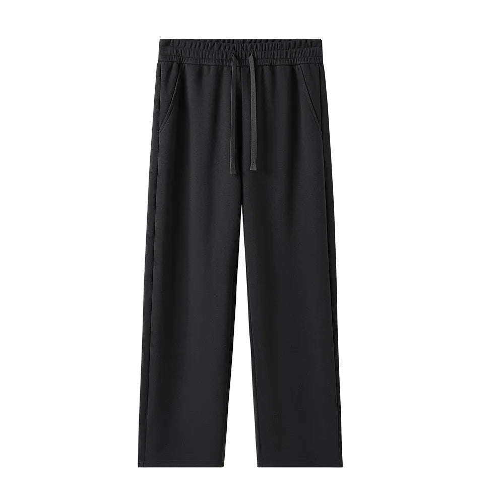 High-waisted straight-leg cotton pants in heather gray, loose fit, available in multiple colours