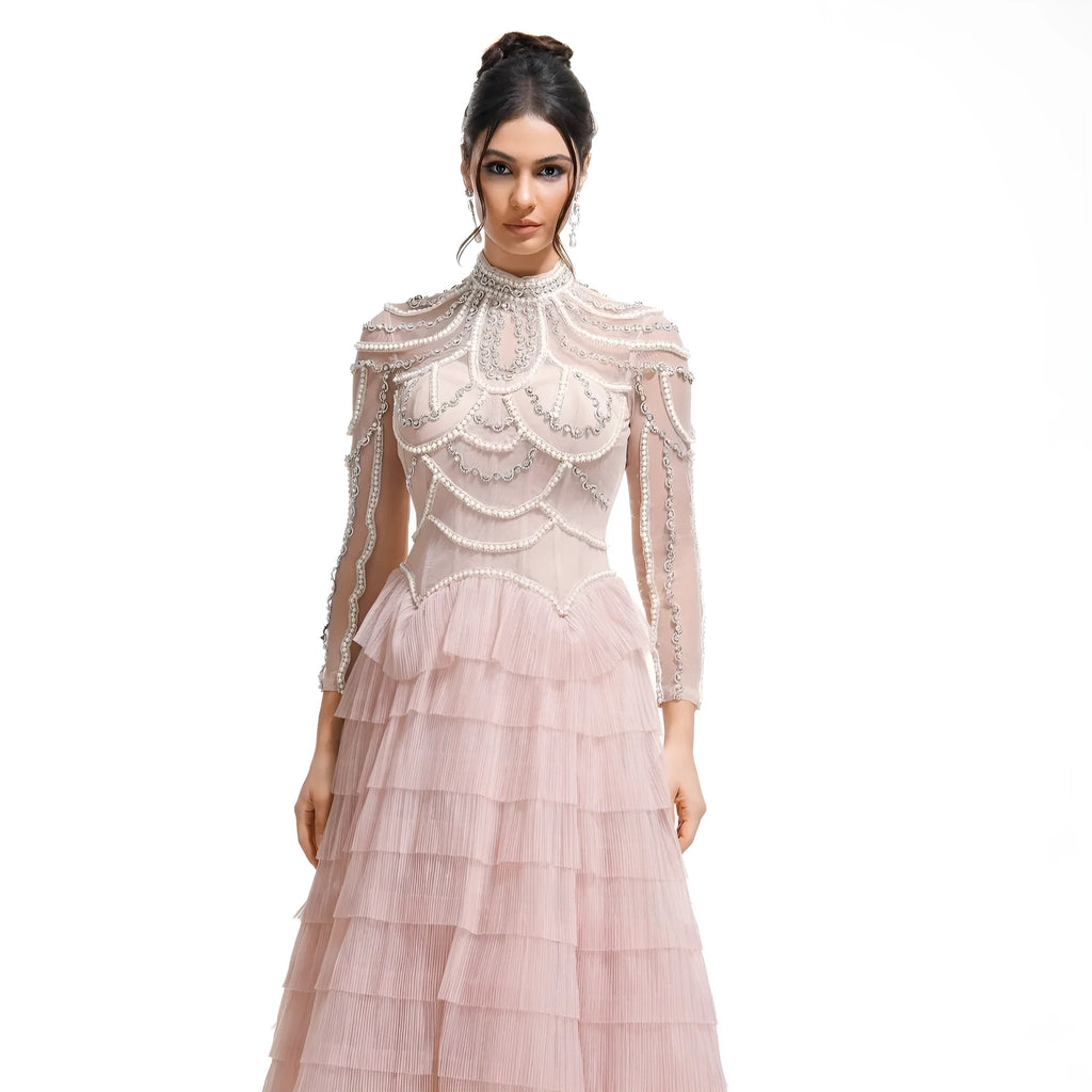 Women's black beaded long sleeve formal dress with floor-length skirt