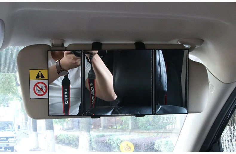 Silver car folding makeup mirror shown closed and open with dimensions 15.5x14cm and 30.5x14cm