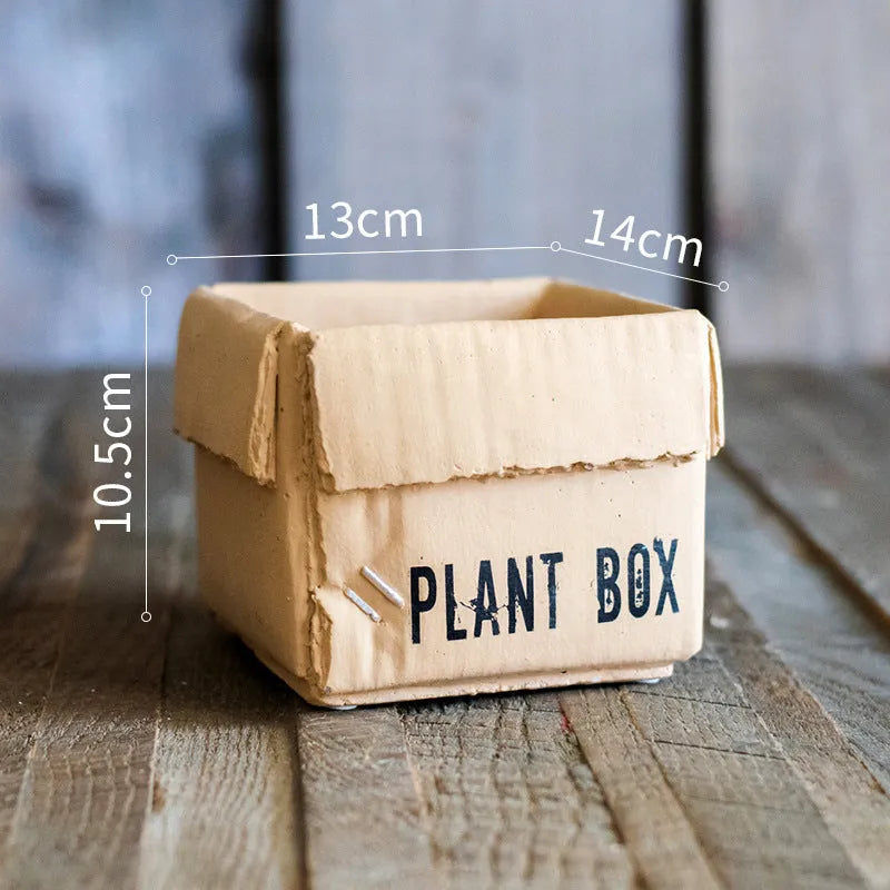 Cement flowerpot with paper carton aesthetic and drainage hole in Nordic style for indoor plants