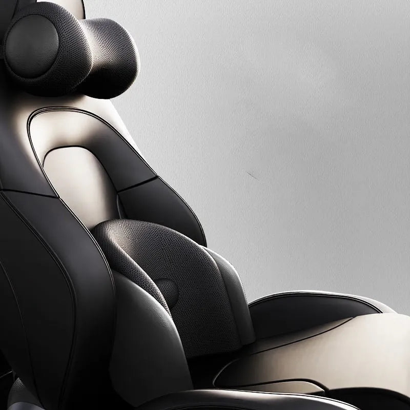 Car seat massage cushion and headrest set made from memory foam in a neutral colour.