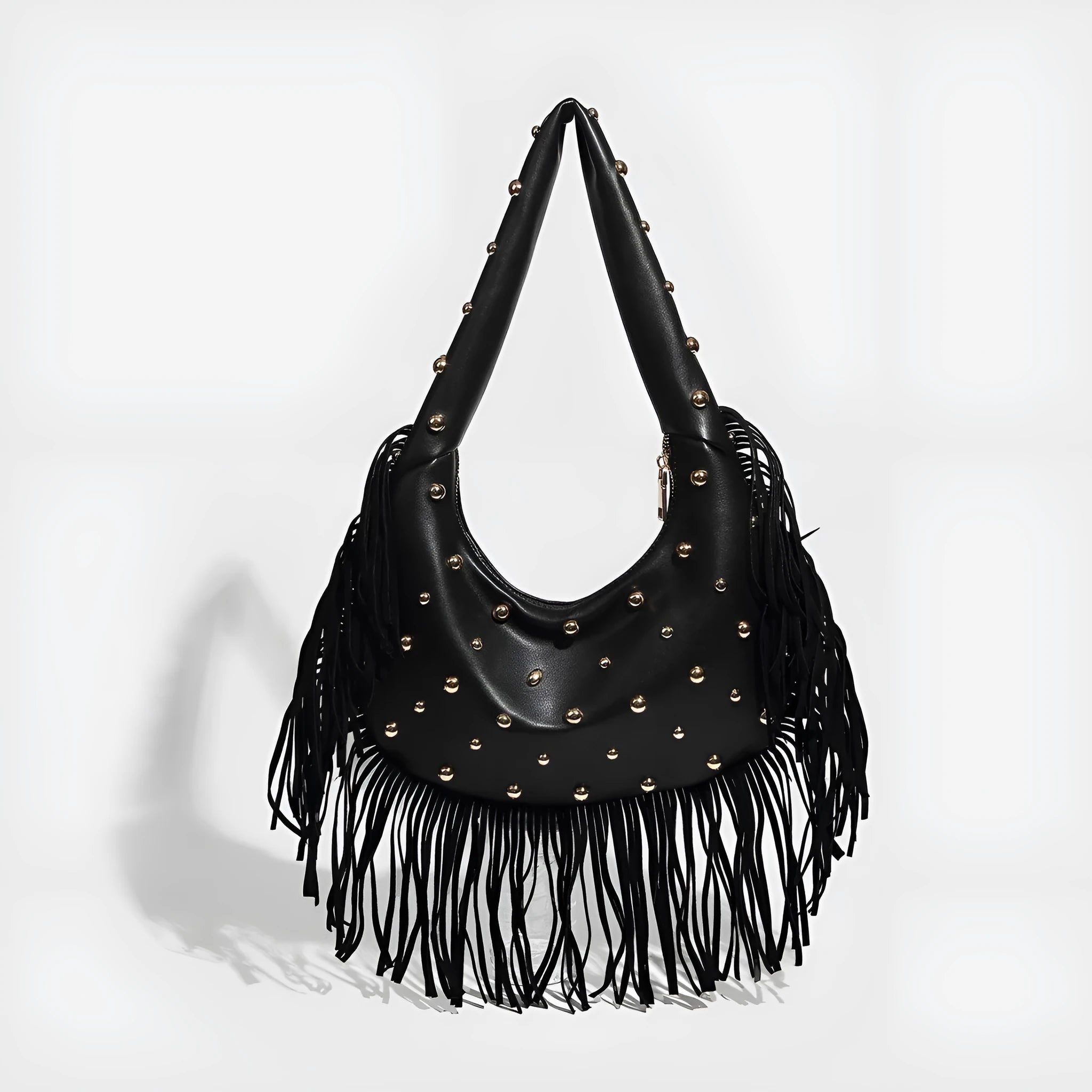 Retro black shoulder handbag with long tassel fringe and internal mobile phone compartment.