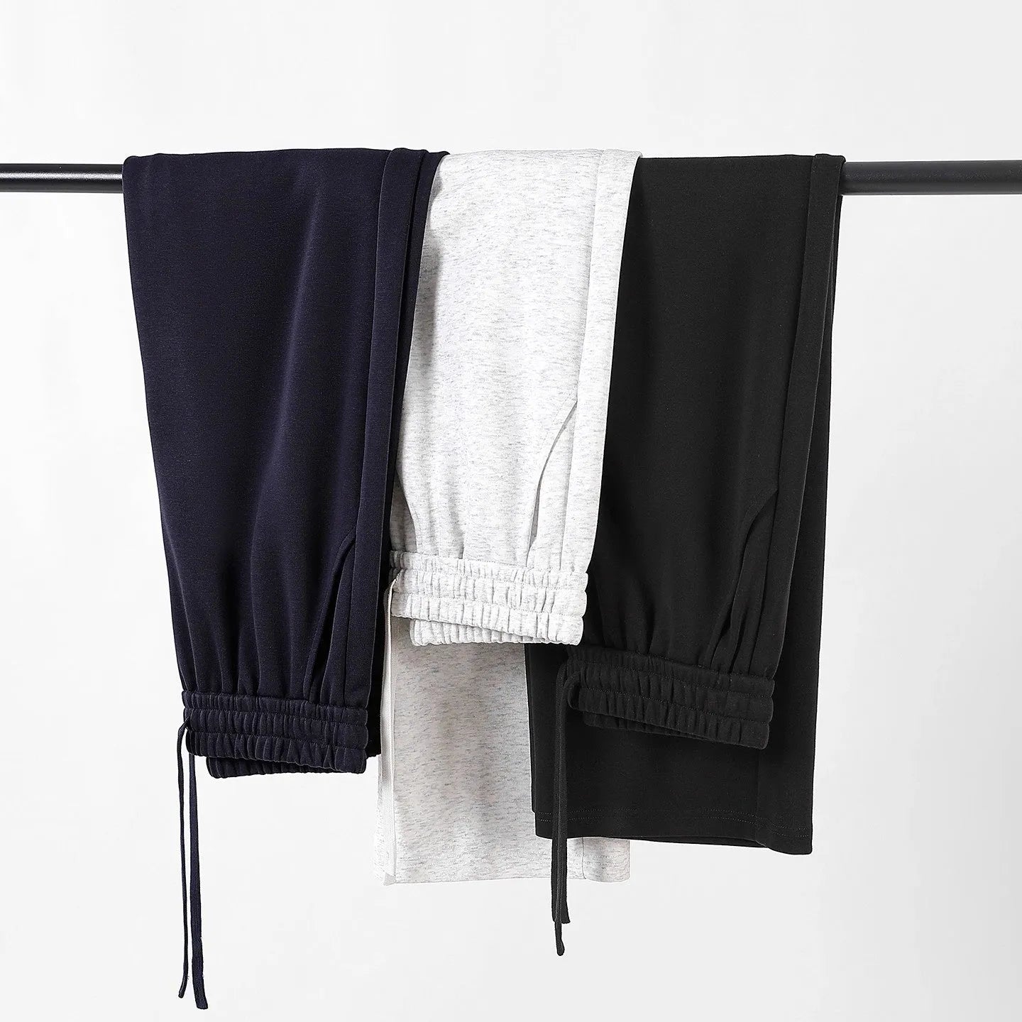 High-waisted straight-leg cotton pants in heather gray, loose fit, available in multiple colours