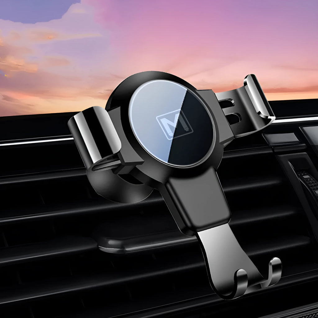 Black ABS plastic S4 gravity mirror mobile phone bracket mounted on a car air conditioning vent.