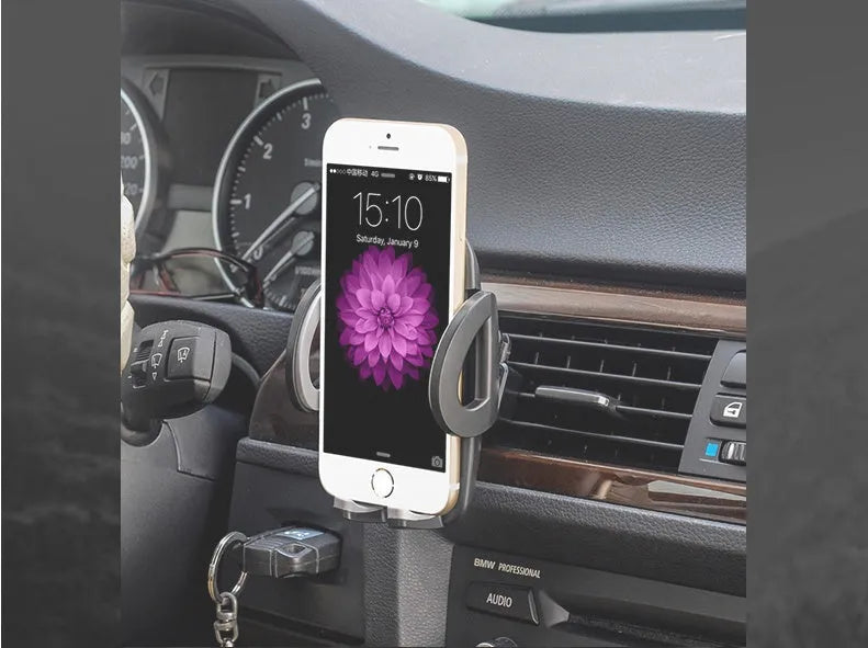 Black car mobile phone holder mounted on air conditioning vent with adjustable clamp for smartphones