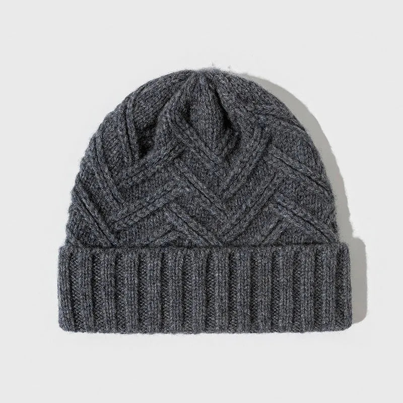 Wool knitted dome crown hat in khaki colour with totem design detail.
