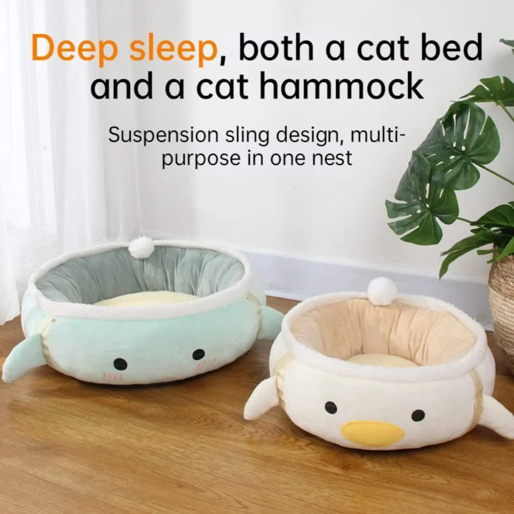 Green dinosaur-shaped cat bed shown both hanging as a hammock and laying flat as a sofa for small pets.