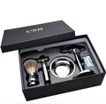 CSB men's shaving kit showing double edge razor, badger hair brush, chrome stand, zinc bowl, blades in black box.