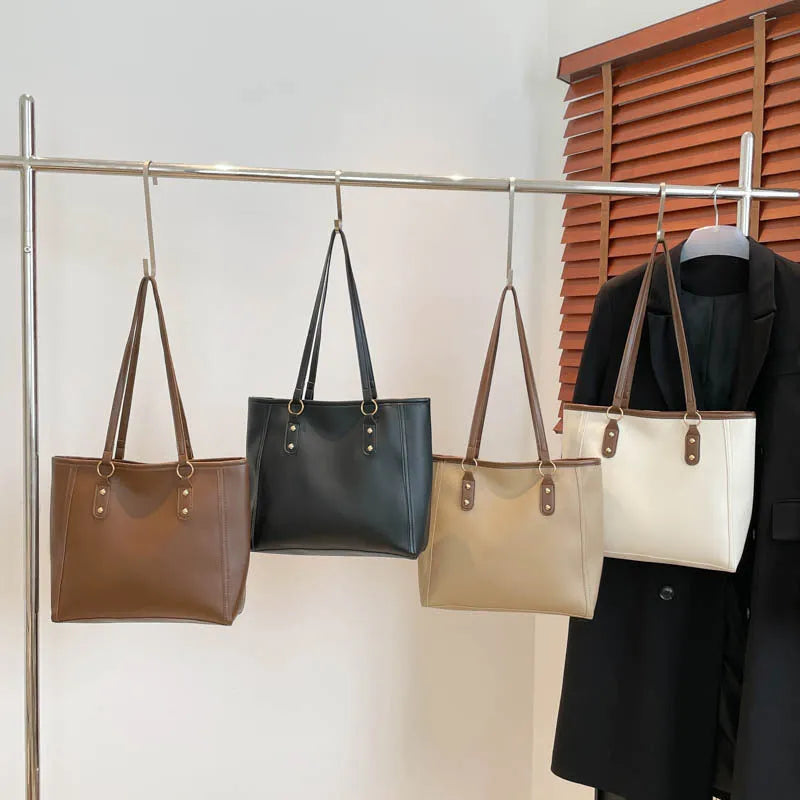 Korean style black PU shoulder underarm bag with a sandwich pocket and horizontal square shape.
