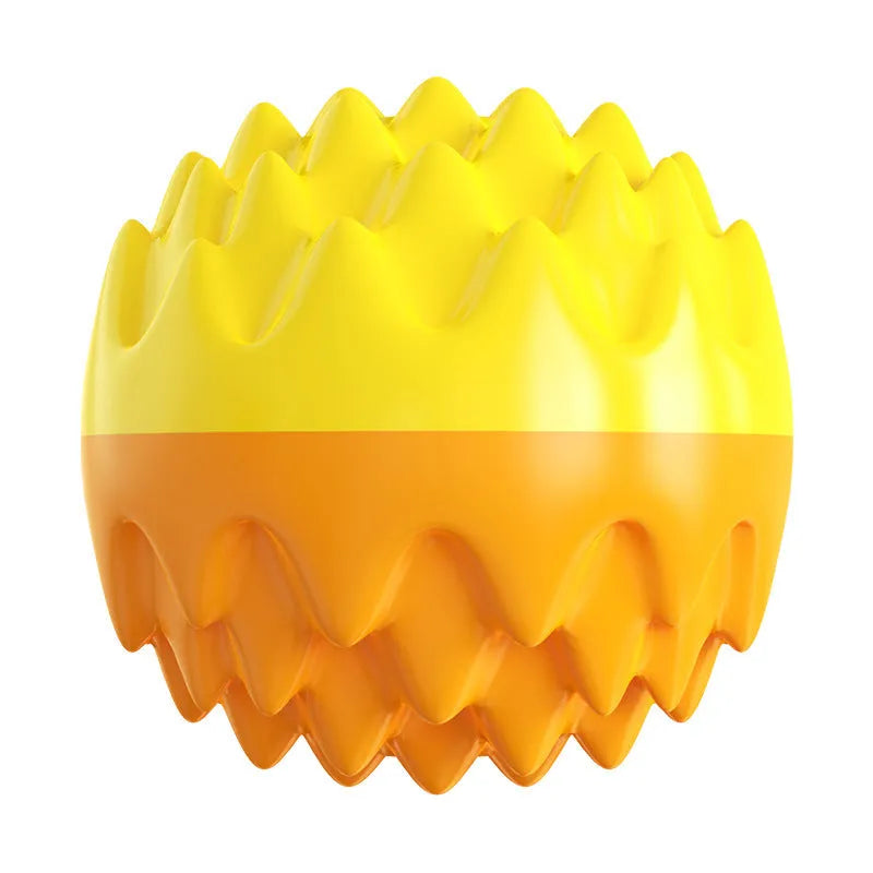 Blue and orange spiky rubber dog ball with squeaker, for teeth cleaning and water fetch.