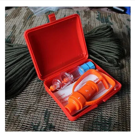 Orange ABS first aid kit open to show a manual suction pump, two suction cups, a tourniquet, and antiseptic swabs.