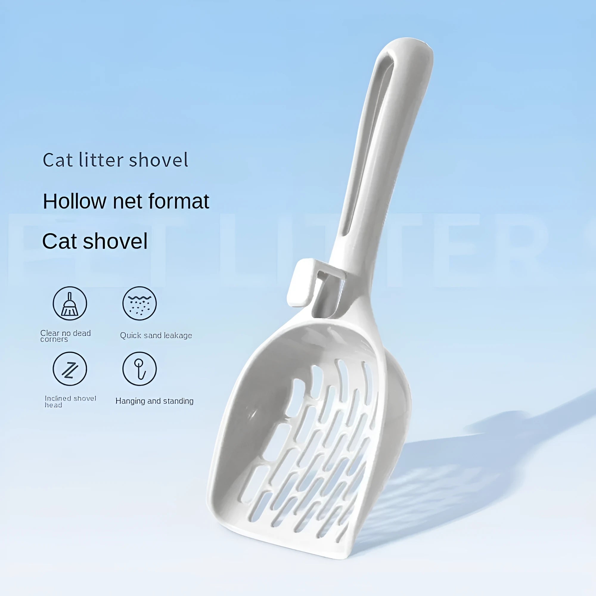 Grey plastic cat litter scoop with integrated base on a white background