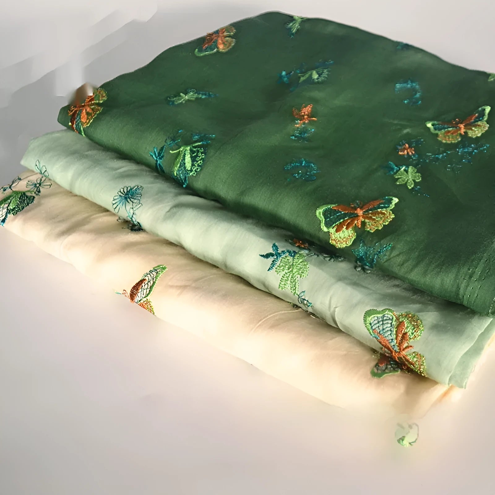 Pure ramie Hanfu fabric in beige, grass green, or dark green colours showing traditional cloth texture