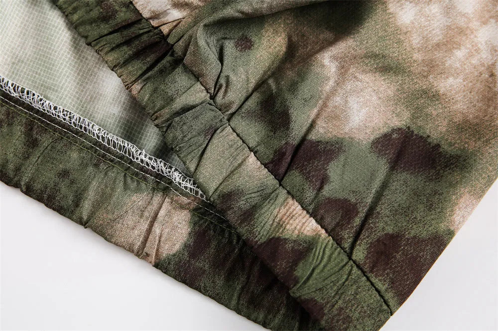 Hooded camouflage sun protection jacket for men, loose fit polyester fibre, shown in camouflage colour.