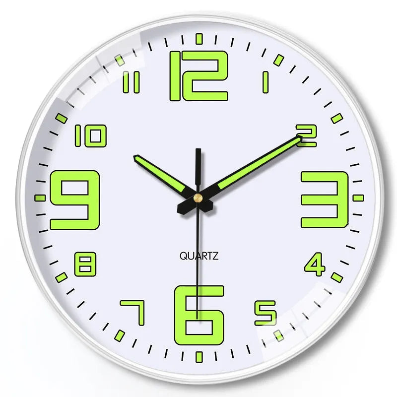 8 inch modern wall clock with luminous hands and black numerals on a light dial.