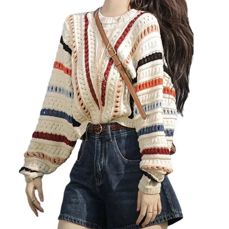 Women's rainbow striped batwing sleeve pullover sweater with a loose fit and round neck.