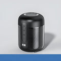 Black portable Bluetooth speaker showing front grille and control buttons