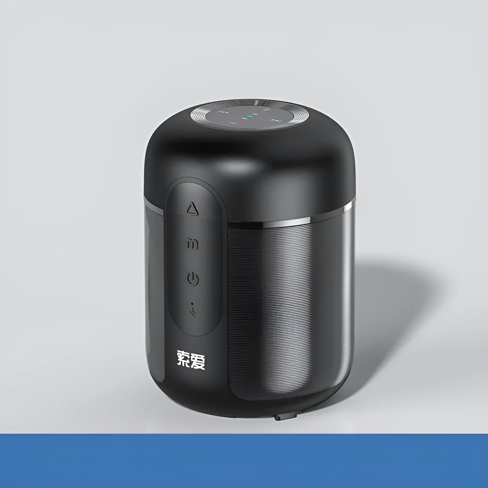 Black portable Bluetooth speaker showing front grille and control buttons