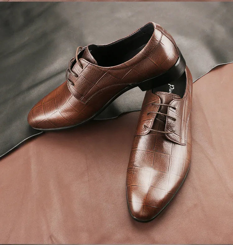Men's black leather derby shoes with a pointed toe cap and anti-skid rubber sole.