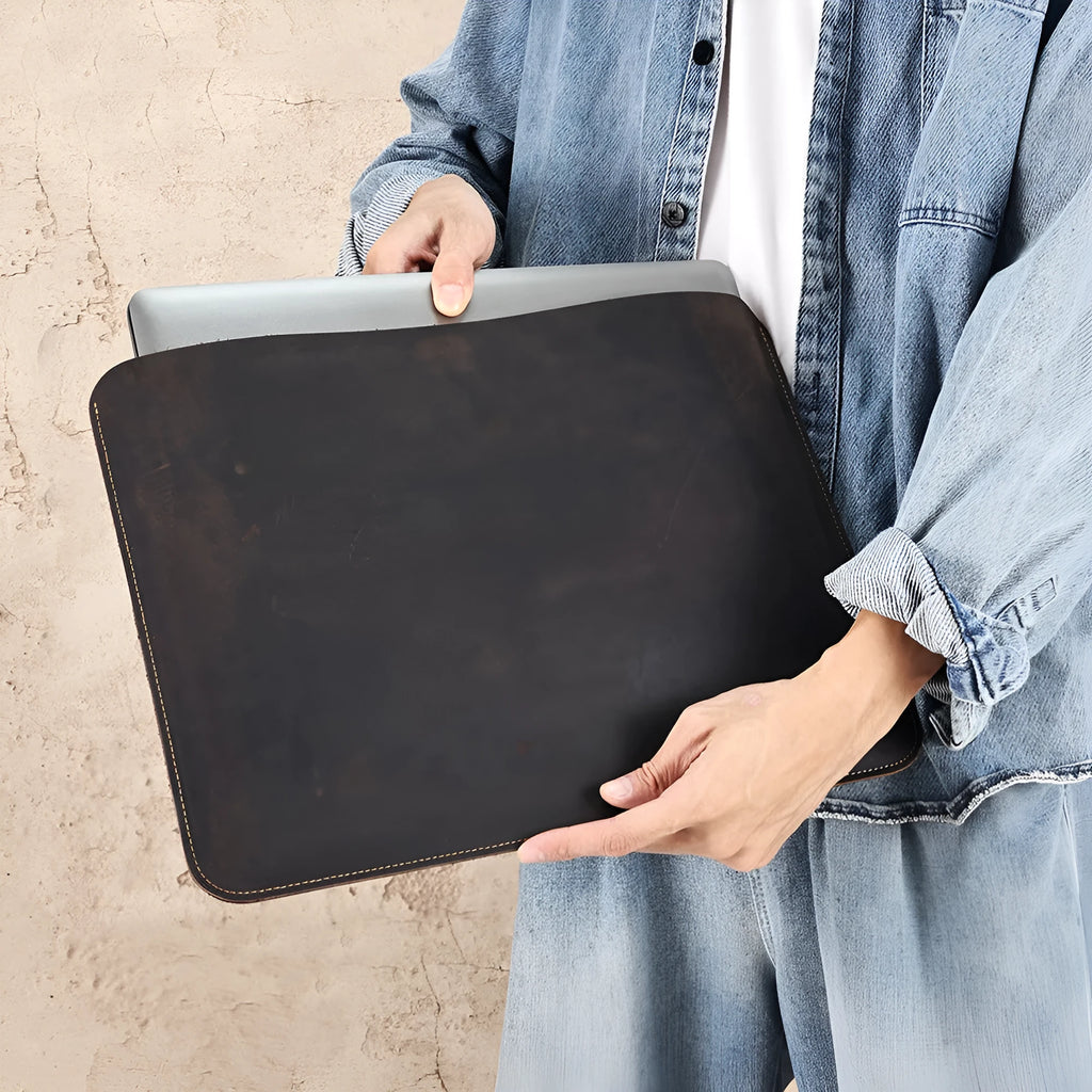Brown genuine leather computer bag with horizontal liner design for organised storage